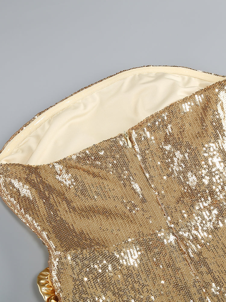 Goldfarbenes Glitzer-Kleid im Detail